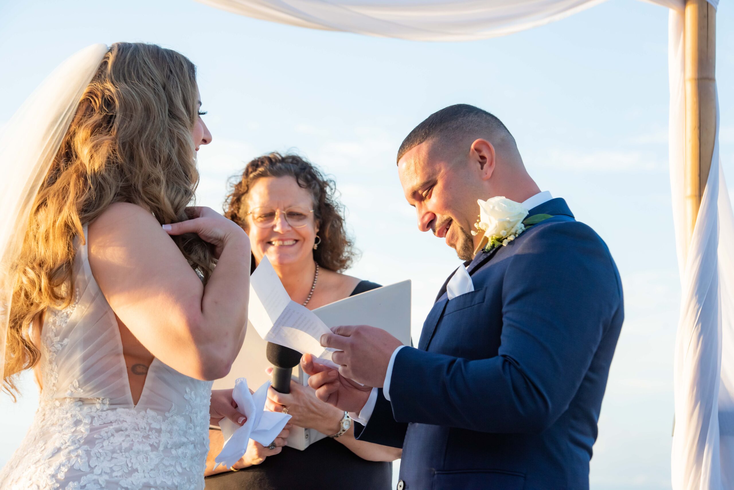 Bride and groom during wedding vows captured on film
